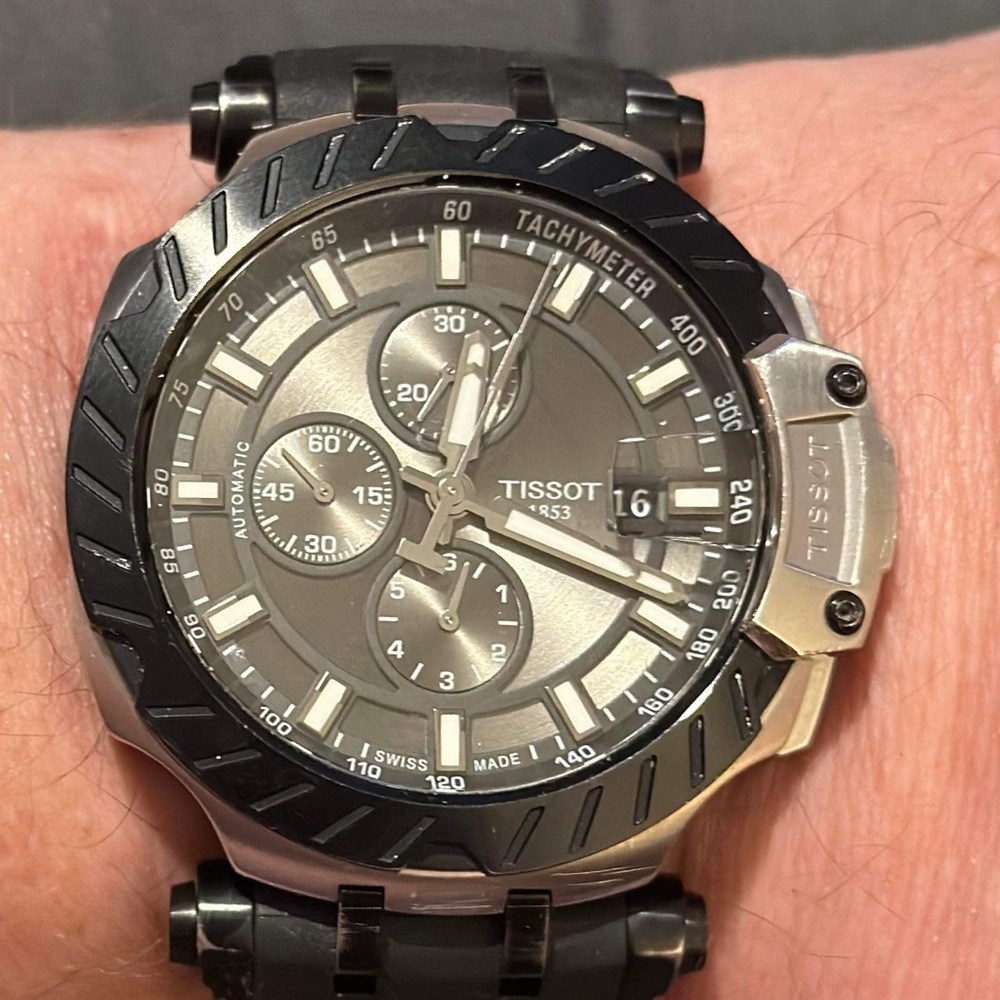 Tissot t-race automatic chrono watch with the anthracite dial blk and red band